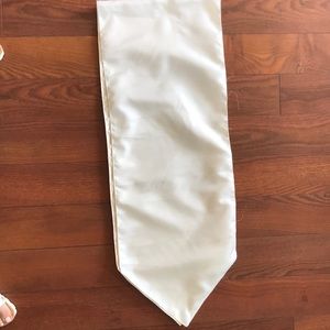 Two ivory table runners